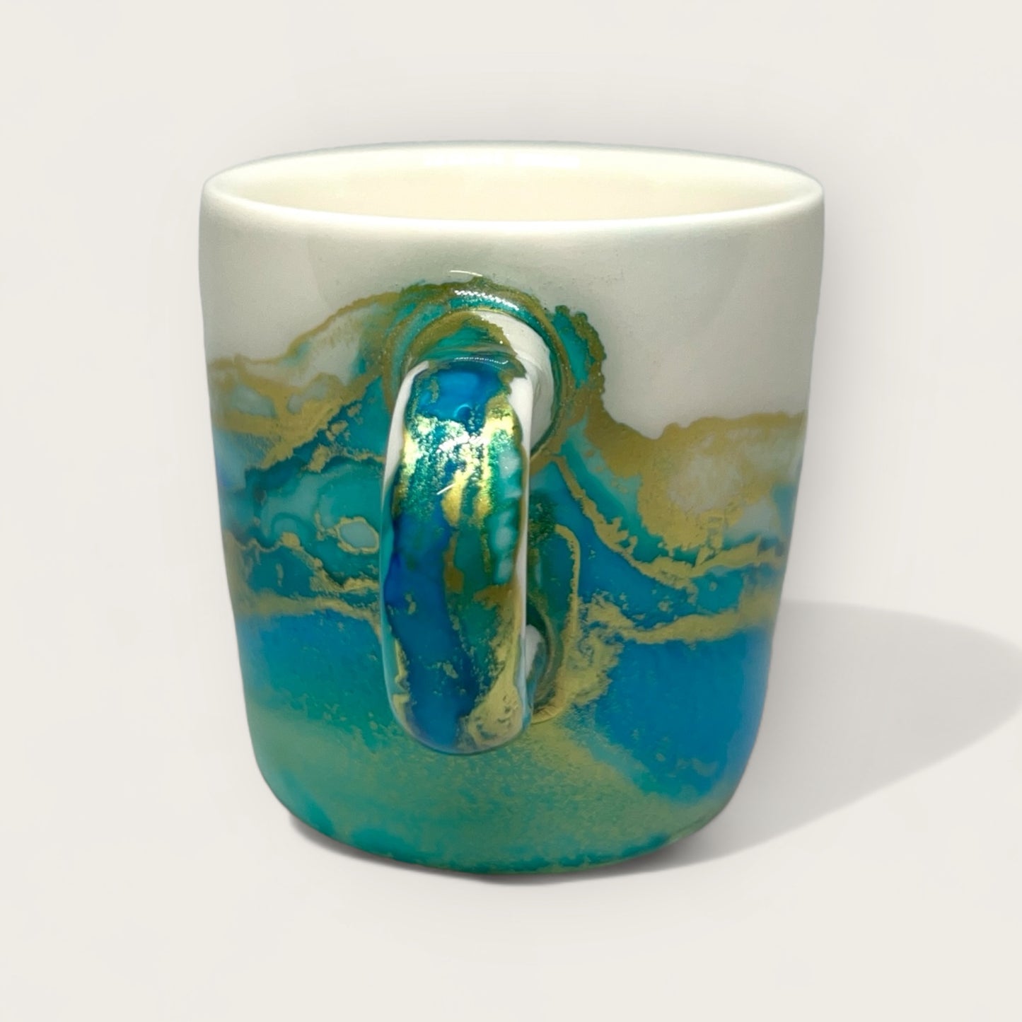 Turquoise green with blue and gold hand-painted espresso cup