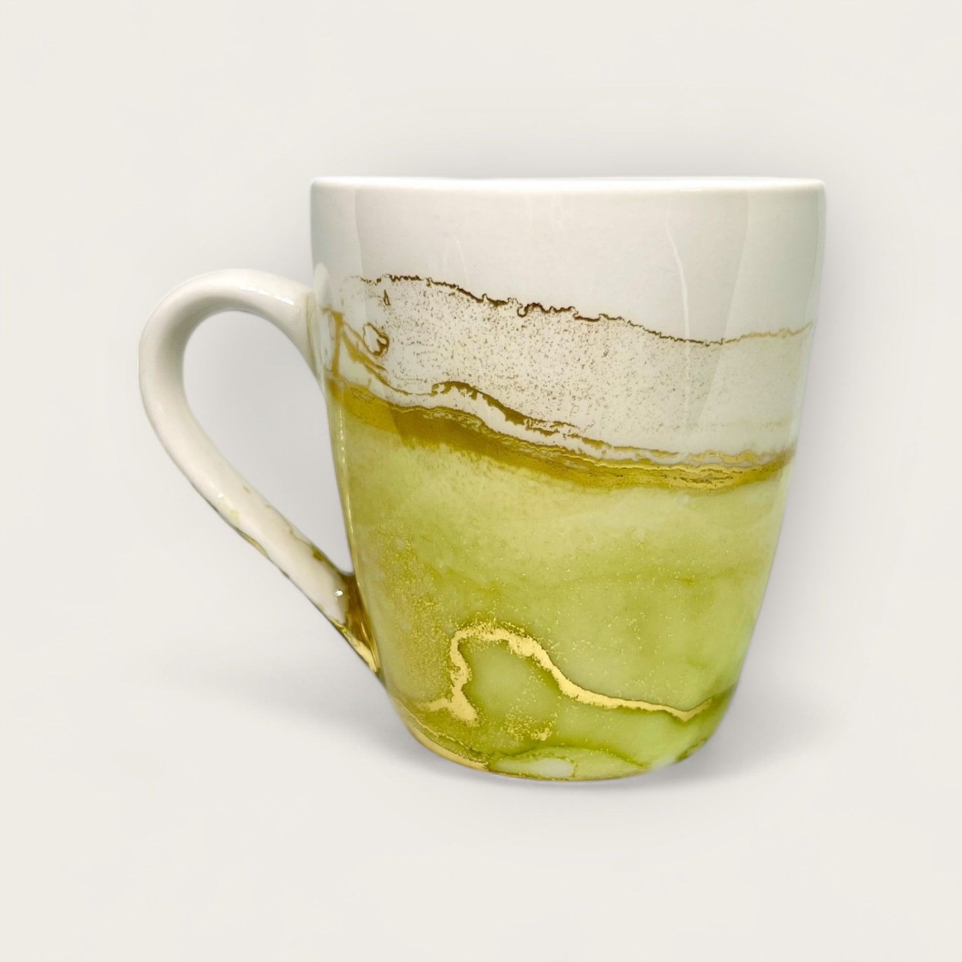 Green and gold coffee mug