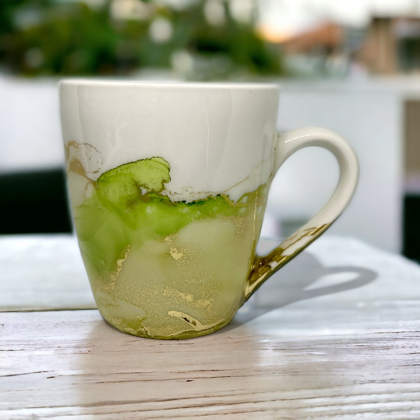 Tall green hand-painted mug