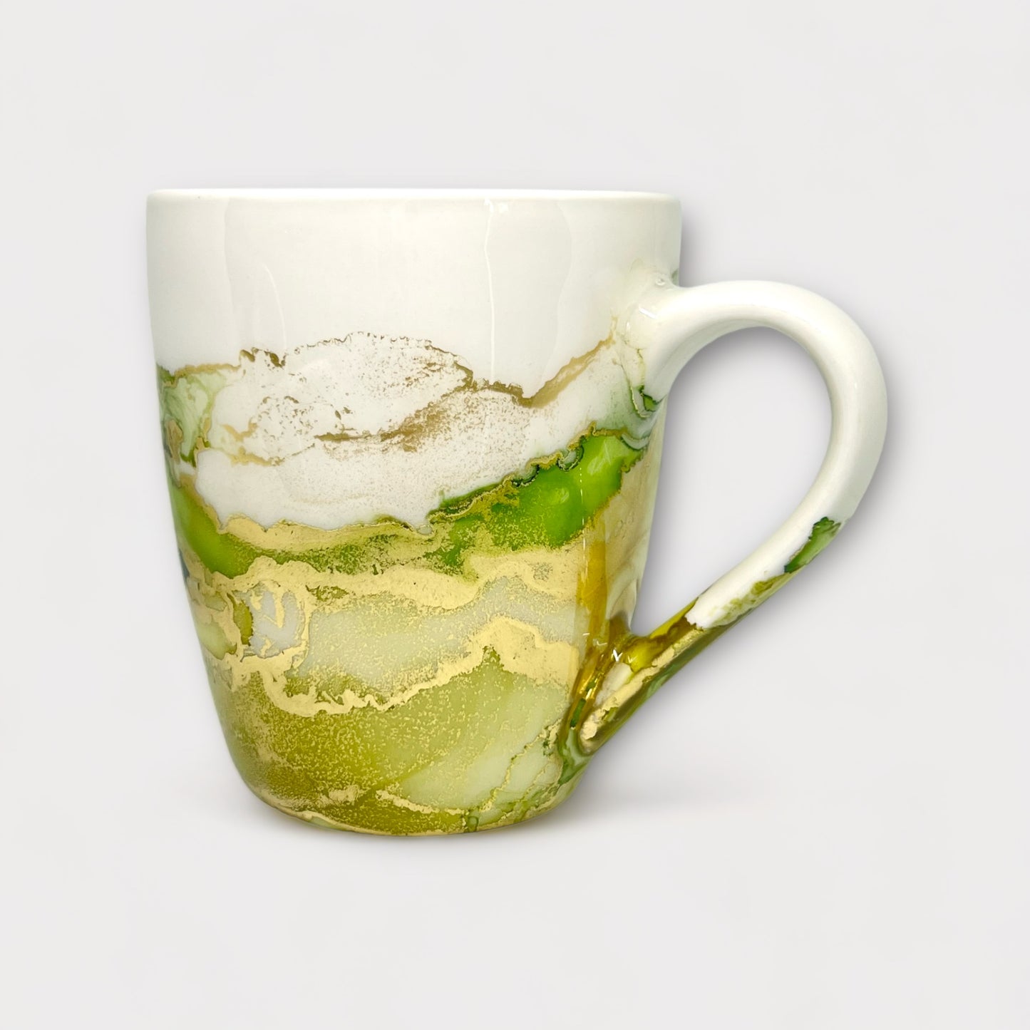 green and gold hand painted tea mug