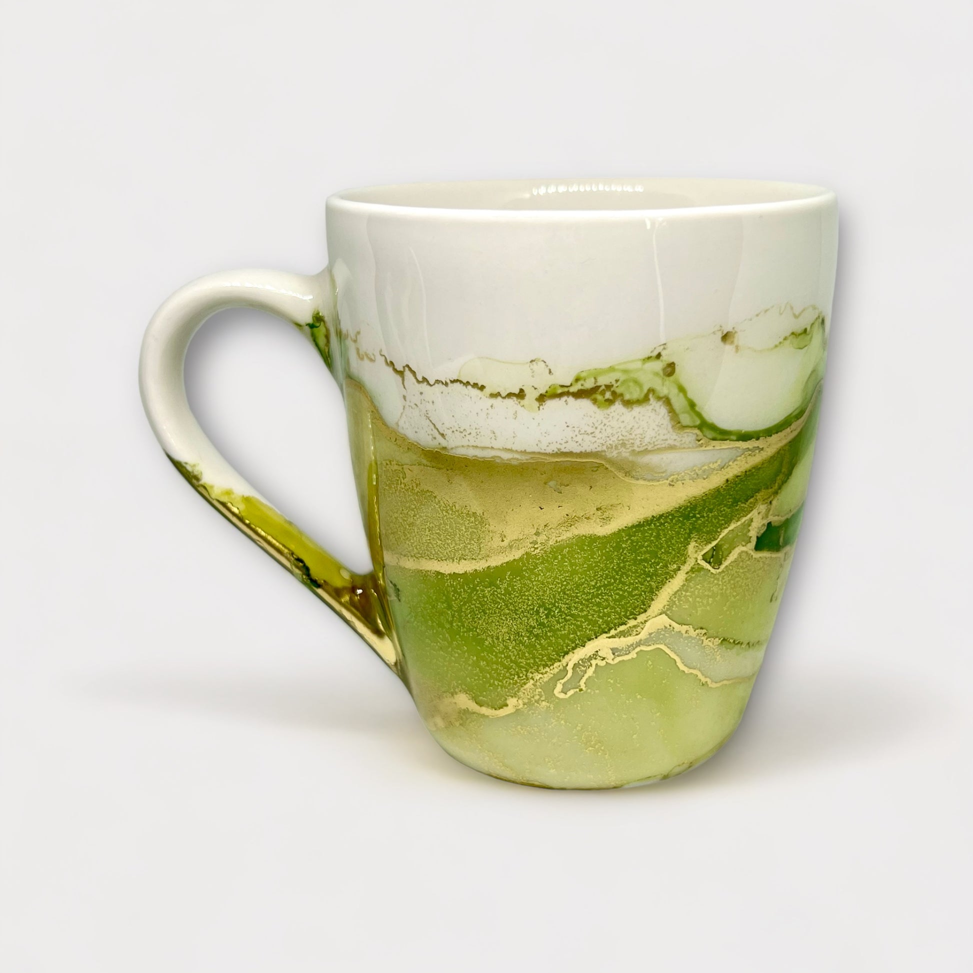 green and gold hand painted tea mug