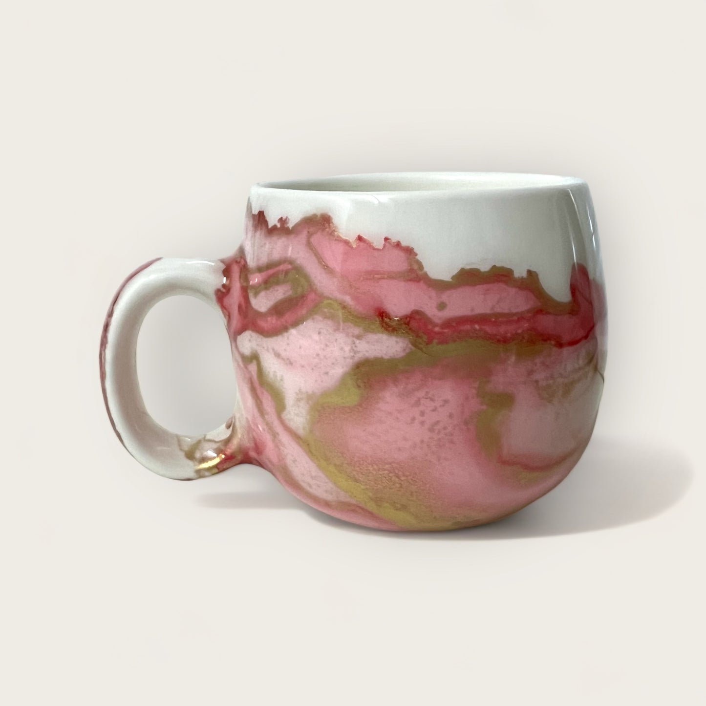 Large rounded pink and gold hand- painted mug