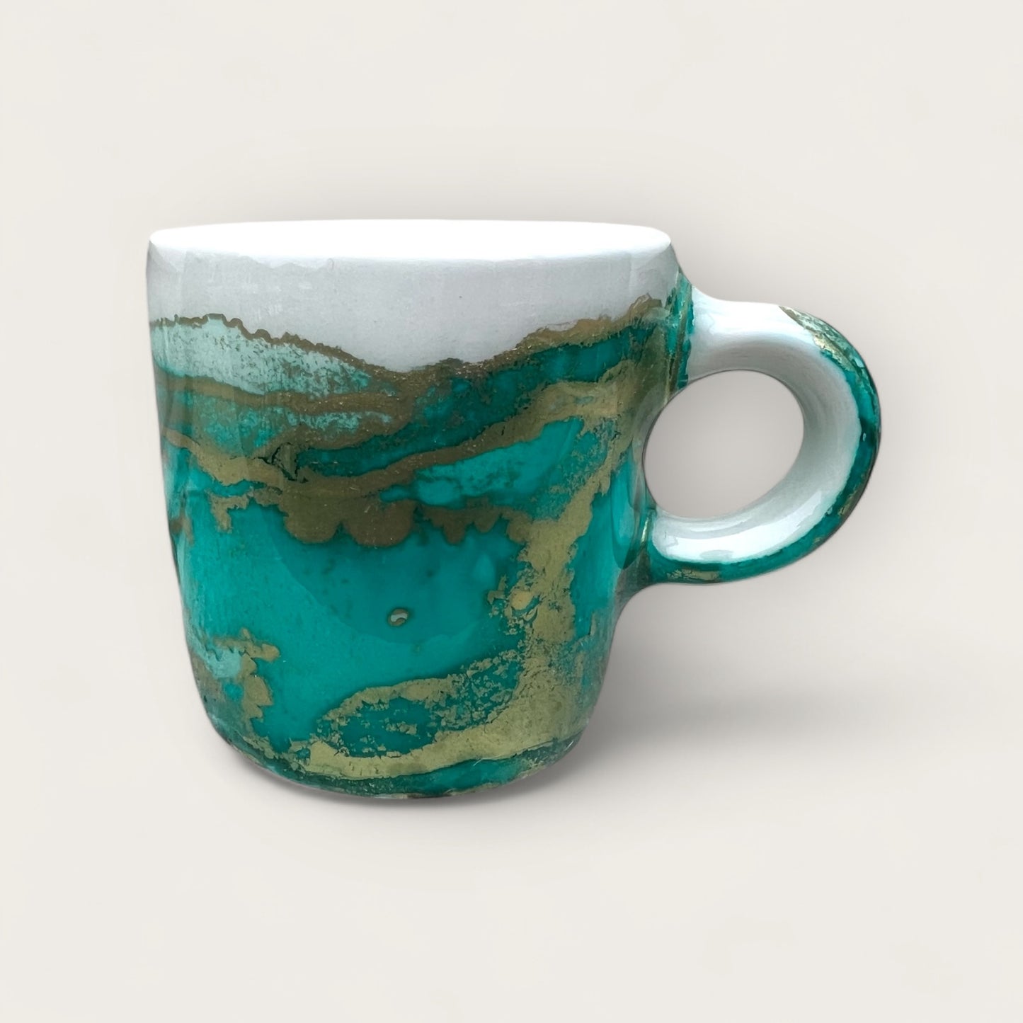 Turquoise and gold espresso cup